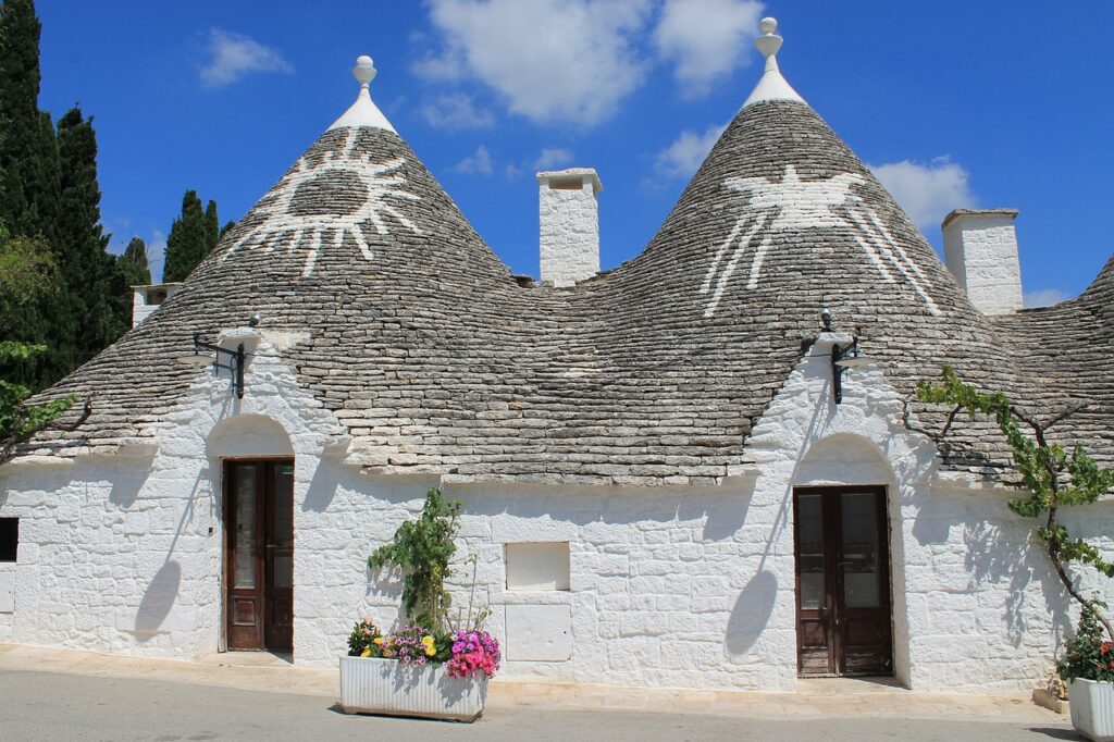 Trulli houses lining a street in Alberobello, Puglia