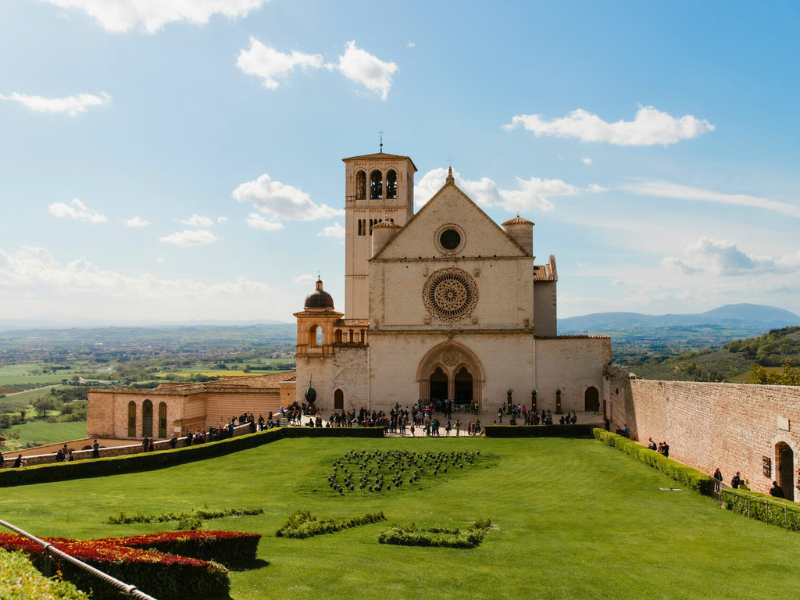 Italian Basilica with green lawn in front