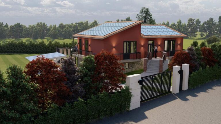 Large property with terracotta colored exterior and trees in background