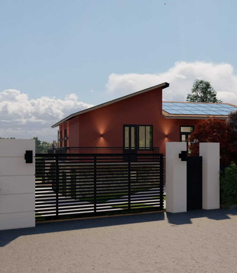 Luxury house with terracotta render behind gate