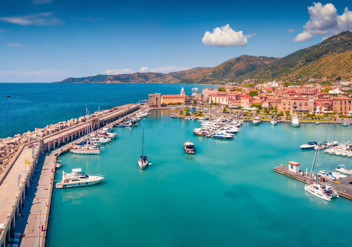 Panoramic summer view from flying drone of Acciaroli port. Wonderful outdoor scene of Mediterranean coast of Italy