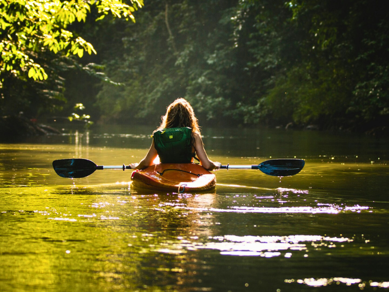 costa rica area guide girl in a kayak on river