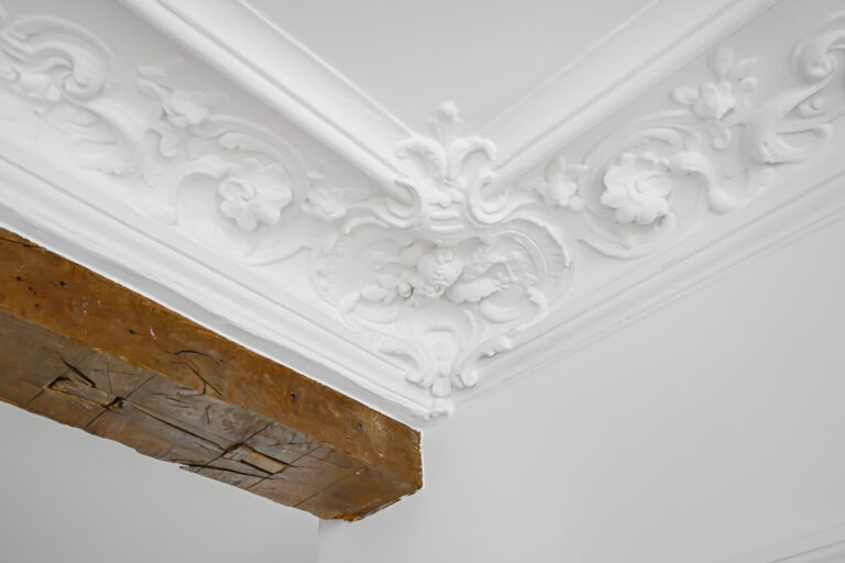 Ornate ceiling and wood beam