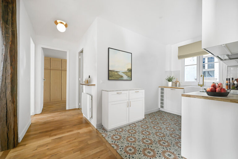 wood and designer tiled floor kitchen in Paris apartment