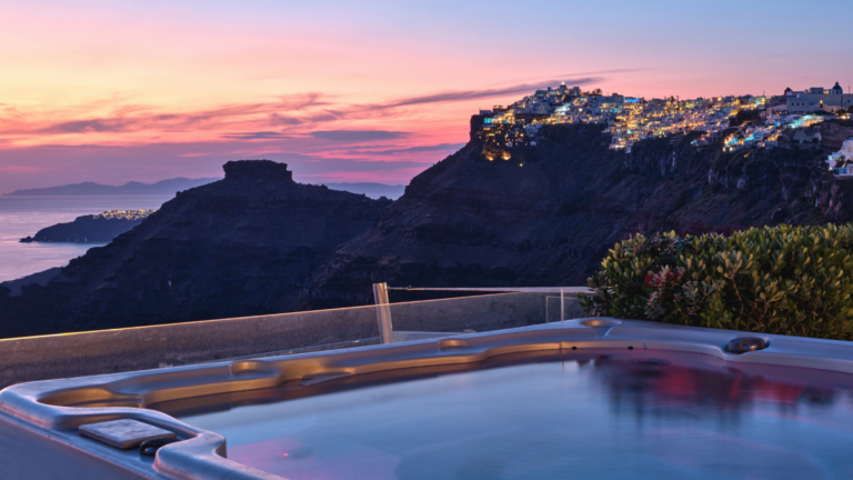Firostefani Santorini Caldera Villa View jacuzzi outside at sunset