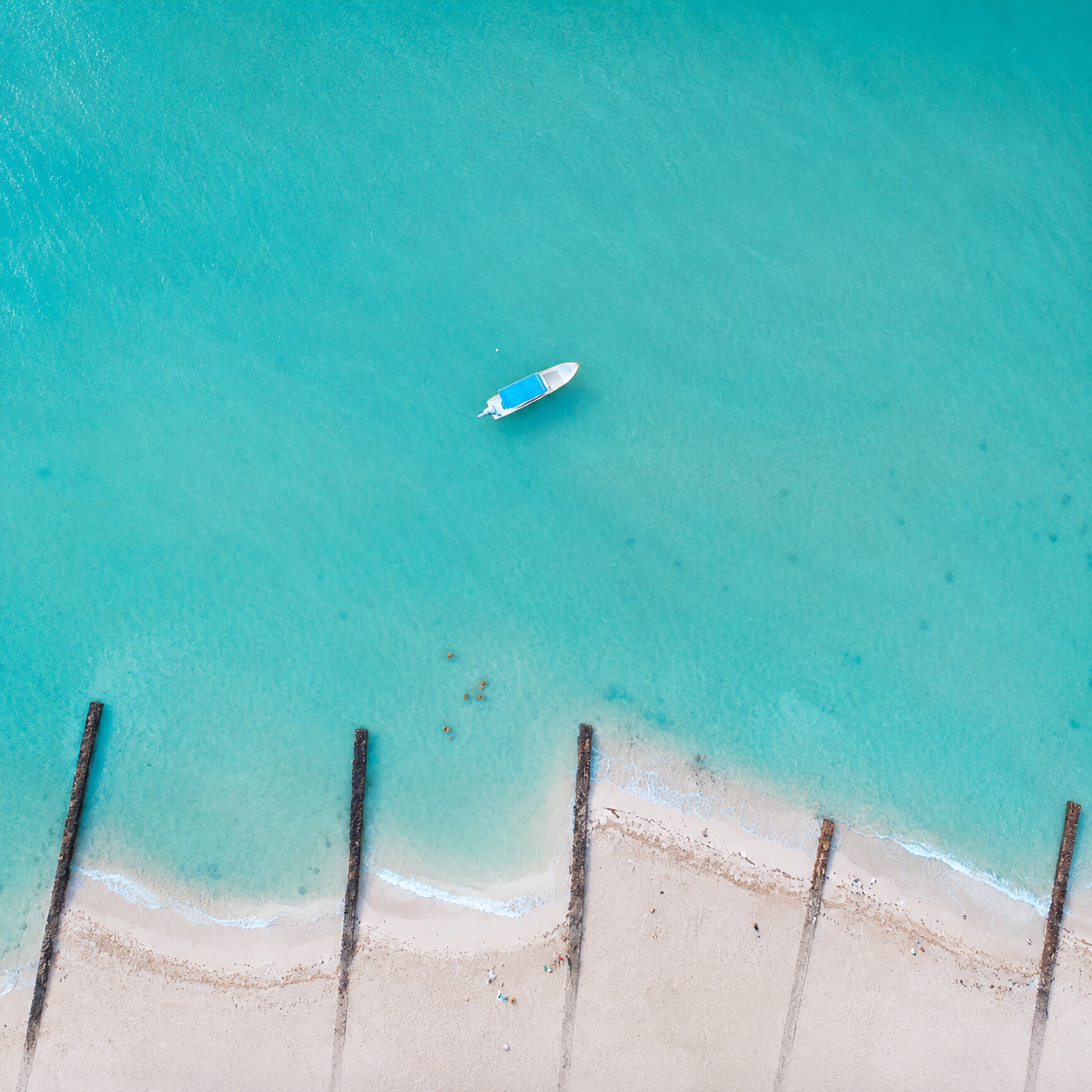 Chelem blue water with boat, Yucatán, Mexico
