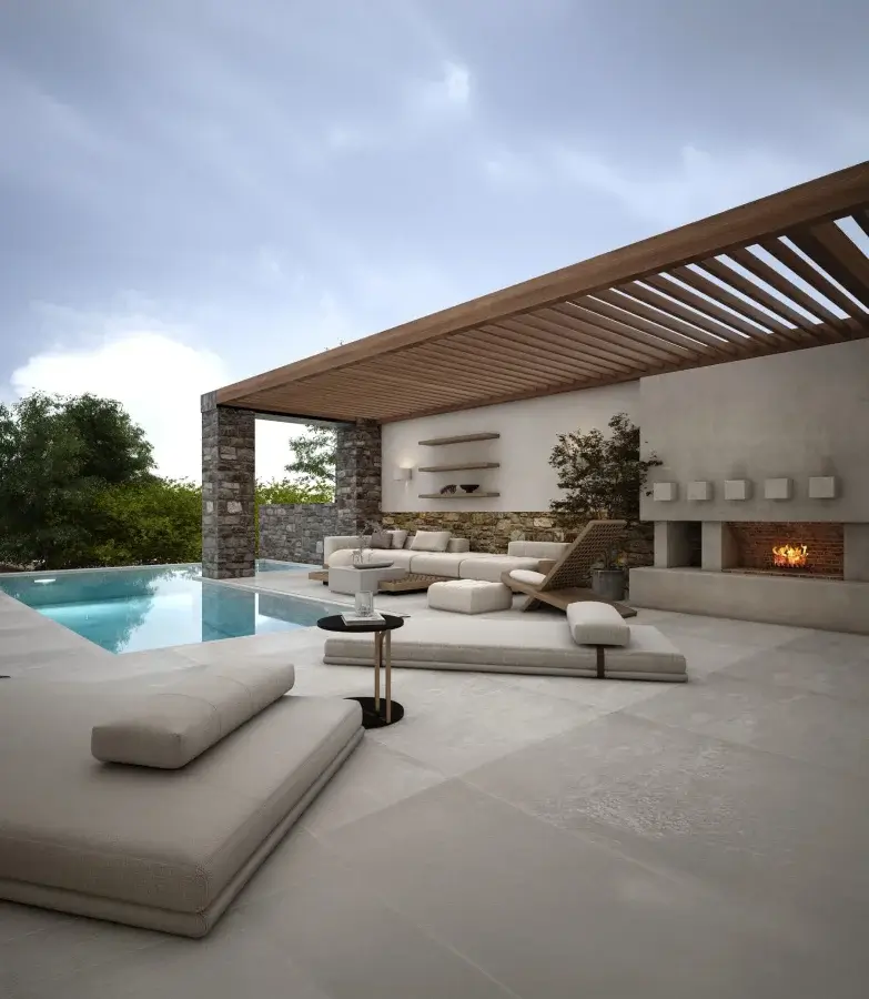 Exterior of luxury villa with seating and infinity pool